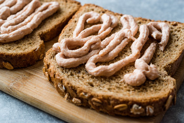 Tuna Cream Paste with Toast Bread on Wooden Board / Creamed Fish Pate.