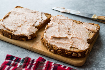 Tuna Cream Paste with Toast Bread on Wooden Board / Creamed Fish Pate.