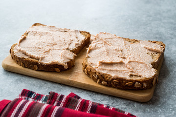 Tuna Cream Paste with Toast Bread on Wooden Board / Creamed Fish Pate.
