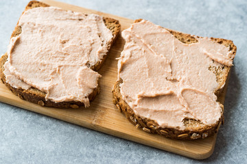 Tuna Cream Paste with Toast Bread on Wooden Board / Creamed Fish Pate.