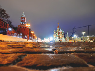 Famous landmarks - St. Basil Cathedral on Red square in Kremlin. Winter evening in Moscow, Russia.