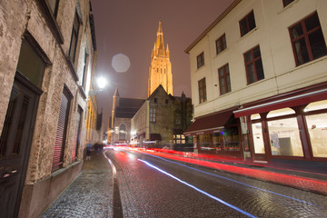 Fototapeta na wymiar BRUGES BELGIUM ON NOVEMBER 24, 2018: Cityscape by night in the medieval city