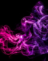 Colored smoke on black background