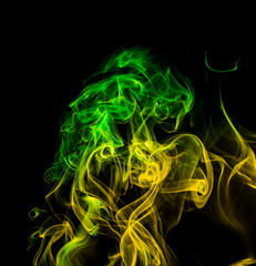 Colored smoke on black background