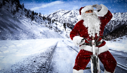 Santa Claus on winter road and snow decoration. 