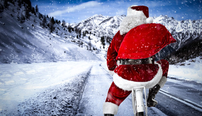Santa Claus on winter road and snow decoration. 