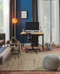 Blue room, lamp and wooden desk for working style and computer close up puff.