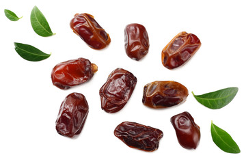 date fruits with green leaves isolated on white background. top view