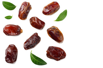date fruits with green leaves isolated on white background. top view
