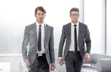 Fototapeta premium young engineers in the office, smoke