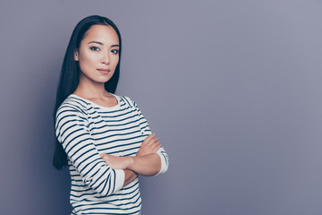 Obraz premium Close up side profile photo of not smiling seriously standing she her girl diligent student worker wearing white striped pullover isolated on grey background