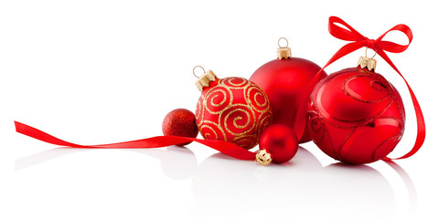 Red christmas decoration baubles with ribbon bow isolated on white background