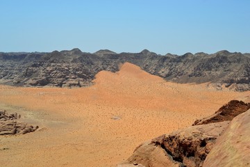 Fototapeta na wymiar Desert tour through sand dunes of Wadi Rum wilderness, Jordan, Middle East, hiking, climbing, driving