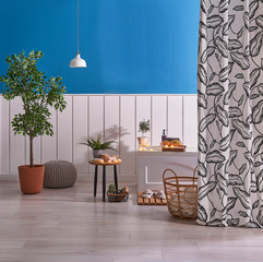 Decorative spa and bath design, white tub, candle and black and white curtain.