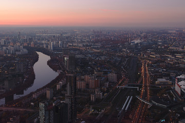 Fototapeta na wymiar Moscow, Russia - December 14, 2018: An aerial sunset panoramic view of Moscow in the evening