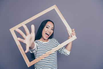 Close-up portrait of nice attractive funny cheerful cheery straight-haired lady in striped pullover...