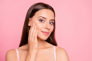 Close up portrait of tender cute gorgeous gentle touching perfect facial skin with hand her she girl wearing pale pink bra isolated on rose background