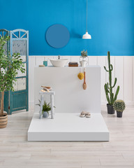 Modern bath room, mirror, sink, towel and decorative cactus style.