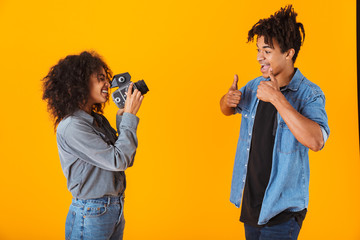 Cheerful young african couple standing