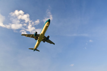 The plane takes off from the clouds. Copy space fot text