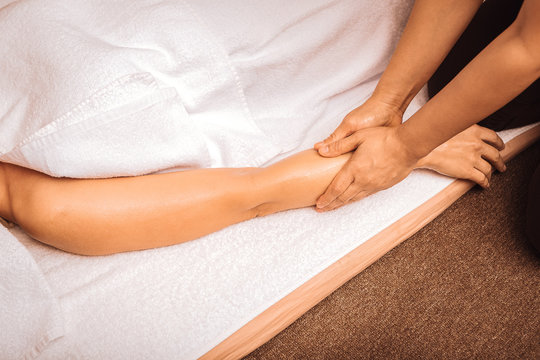 Top view of a female hand during oil massage