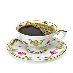 Coffee in antique porcelain cup isolated on white background including clipping path