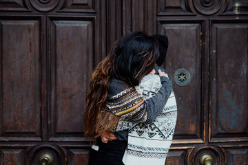 Couple women kissing on the street in Madrid city