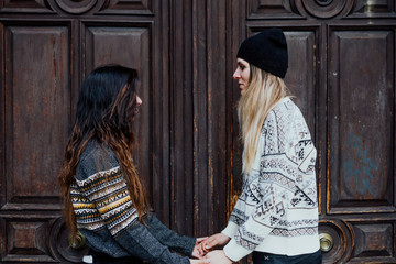 Couple women enjoying on the street in Madrid city