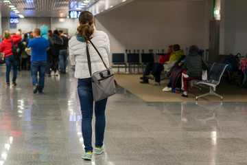 corridor to the boarding gates of the international terminal, passengers are landing.