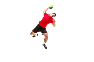 The fit caucasian young male handball player at studio on white background. Fit athlete isolated on...