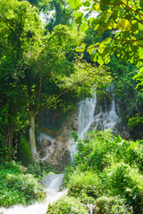 Fototapeta na wymiar beautiful limestone waterfall forest with soft water