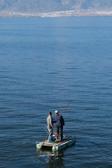 Fototapeta na wymiar man fishing in the sea