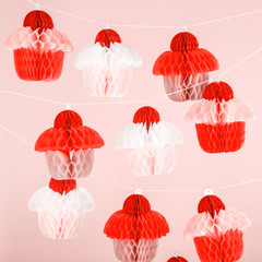 Paper cupcakes celebration decoration. Holiday party concept . Living coral theme - color of the year 2019