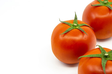 Ripe tomato isolated on white background.