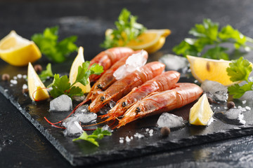 Tiger shrimps with spices and lemon. langoustines