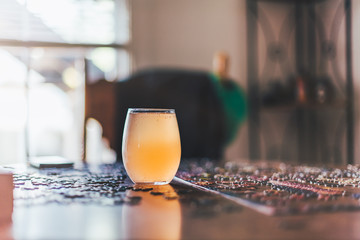 glass on table with puzzle