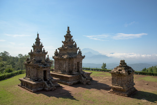 Candi Gedong Songo at sunrise. A 9th-century Buddhist temple complex on a volcano near Semarang, Java, Indonesia.