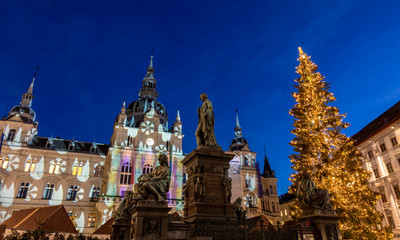 christmas time in graz,the capital of styria,austria. christmassy illuminated townhall on the main...