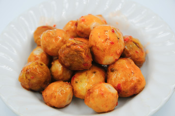 Fried meatballs on white background