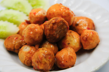 Fried meatballs on white background
