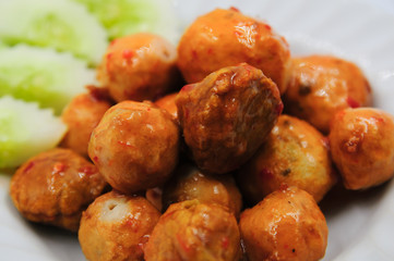 Fried meatballs on white background