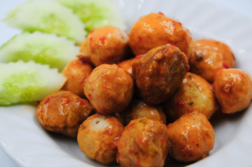 Fried meatballs on white background