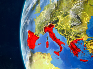Southern Europe from space on model of planet Earth with country borders and very detailed planet surface and clouds.