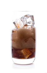 Cola in glass with ice cubes on white background