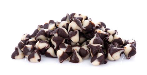 Chocolate chip morsels spread on white background