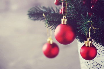 Christmas background with xmas fir branches and decorations. Christmas greeting postcard.