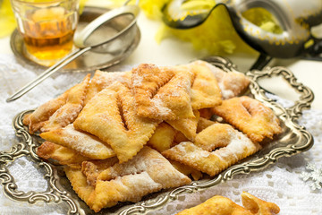 Traditional sweet crisp Angel wings with powdered sugar and rum