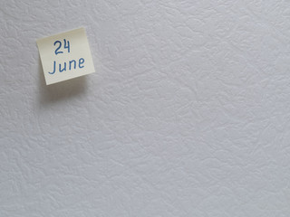 June 24, calendar date sticky note