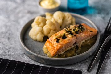 Solomon fillet with pineapple and cauliflower. Fish with vegetables.