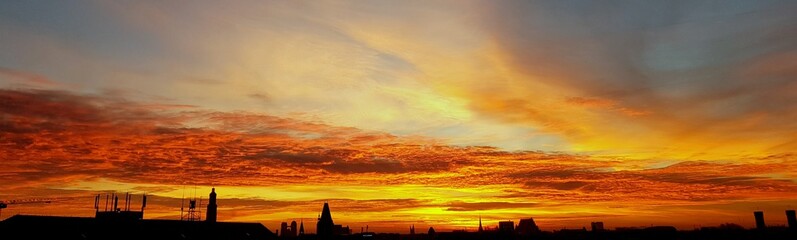 Beautiful colorful sky above Wroclaw, amazing landscape of the Polish city during the sunrise